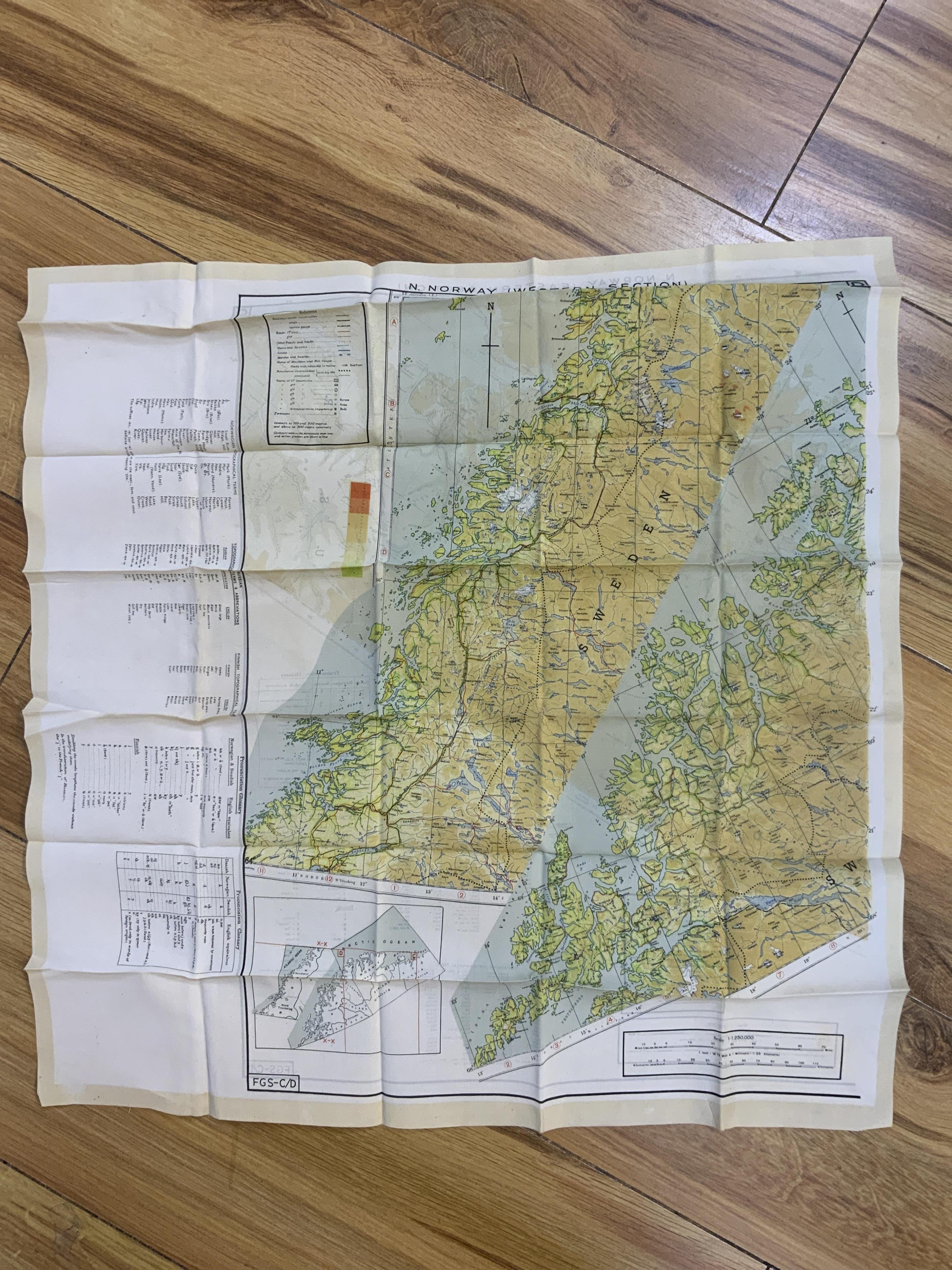 Four ‘escape’ style maps printed on silk type material, three printed double-sided; North Norway, 47x49cm, parts of Italy and Greece, 53x62cm, parts of France, 44x53cm, and a single sided map of part of the Mediterranean